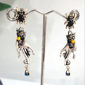 WITCHY EARRINGS Crystal spider w hand holding crystal. 3" drop Fortune Teller
